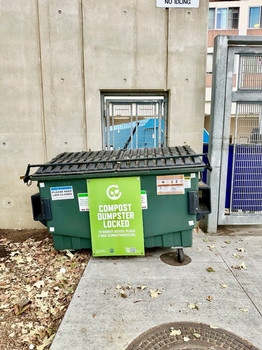 compost bin located in front of the trash compactors near west building 3